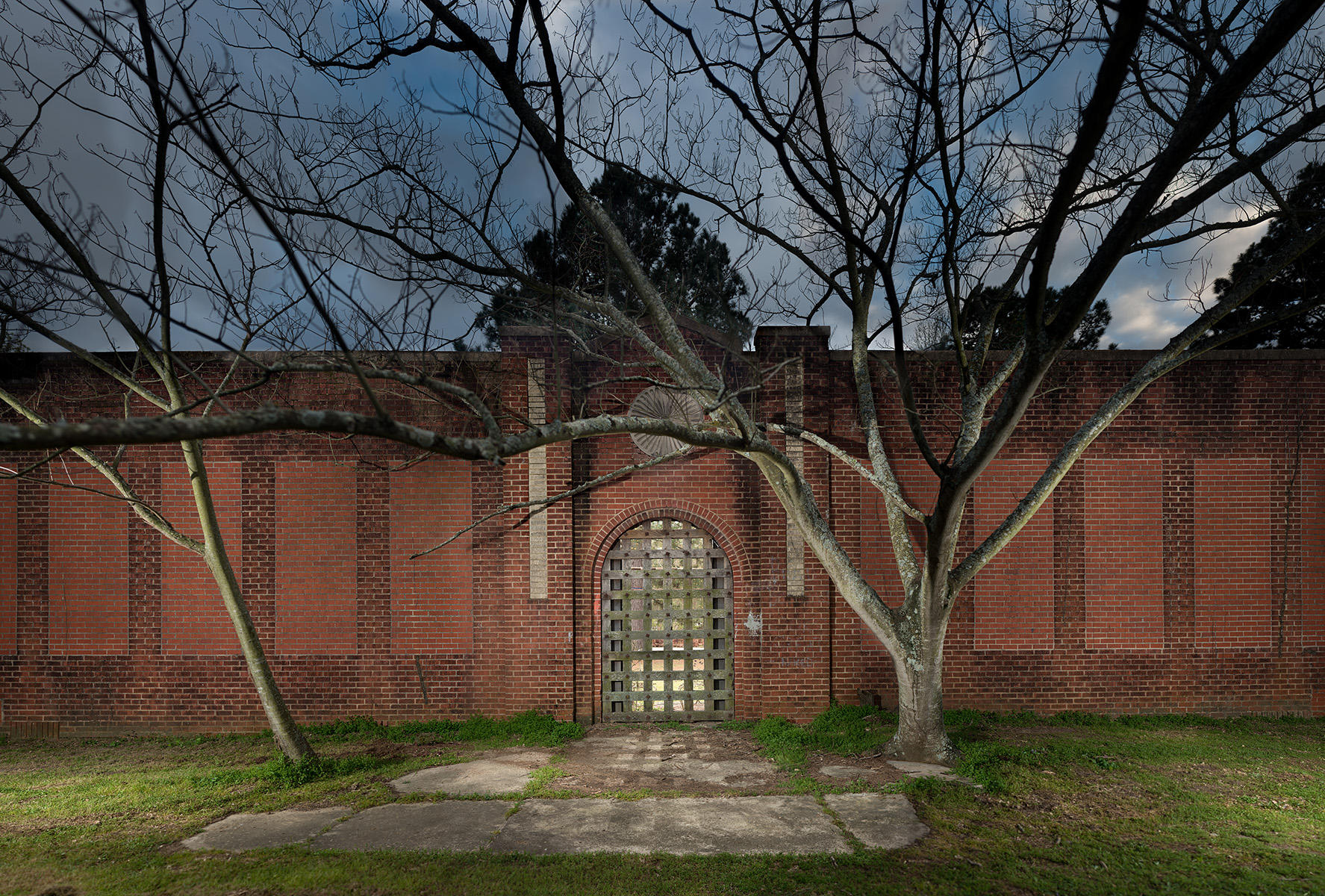 <div class="storycaption">
	<div class="galleryIntroTextArea holder">
		<div class="galleryIntroTextContent">
			<div class="galleryIntroTextContentInside">
				<div class="frishhead">
					REMAINS OF ROSENWALD SCHOOL 
				</div>
				<div class="frishsubhead">
					WHITE OAK, TEXAS 
				</div>
				<div class="frishtext">
					The newly freed African Americans of the Shiloh Community established a school for their children shortly after the Civil War. The one-room building was demolished in the late 1800's and classes were held at the Shiloh Baptist Church. With financial assistance from the Julius Rosenwald Fund, a new two-room school was erected in 1920. It was replaced by a large brick building in the 1930's. The High School was closed in 1949; the end of segregation closed the rest of the Shiloh School in 1966. Shiloh graduates became contributing citizens in Texas and the nation. Long vacant, the school building was later used to store chemicals for a plastics company, and burned in 1993. All that remains is the brick front wall. In many communities there were no schools for children of color. These children would receive their education, if they were lucky, at home or in a church. Partnering with Booker T. Washington, the Rosenwald Foundation helped build nearly 5,000 schools by 1932. The effect of Rosenwald's approximately $70 million (in today's dollars) investment was transformative. By 1932, Rosenwald Schools educated more than 35 percent of all African American children in the South. Fewer than 60 of the buildings remain in 2019. 
				</div>
				<div class="frishdate">
					PHOTOGRAPHED: 2018 
				</div>
			</div>
		</div>
	</div>
</div> : IMAGES : Ghosts of Segregation