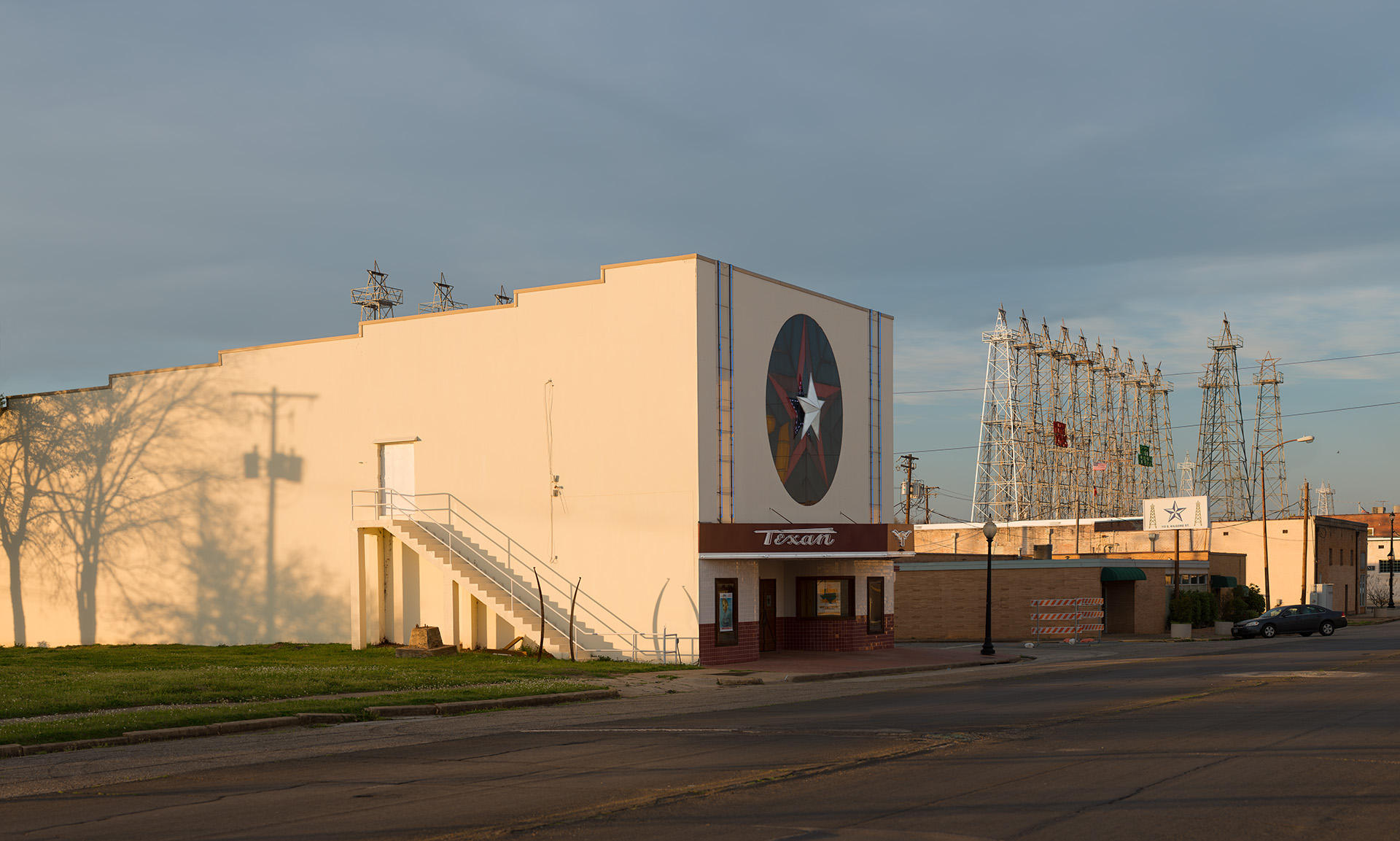 <div class="storycaption">
	<div class="galleryIntroTextArea holder">
		<div class="galleryIntroTextContent">
			<div class="galleryIntroTextContentInside">
				<div class="frishhead">
					COLORED ENTRANCE TO THEATER 
				</div>
				<div class="frishsubhead">
					KILGORE, TEXAS 
				</div>
				<div class="frishtext">
					The enigmatic door atop the stairway on the south side of the Texan Theater, long locked and largely overlooked, is the "colored entrance," a vestige of Jim Crow-era segregation. In Kilgore, Texas, the term "colored" extended to anyone not Caucasian, including Hispanics and the occasional Asian. 
				</div>
				<div class="frishdate">
					PHOTOGRAPHED: 2018 
				</div>
			</div>
		</div>
	</div>
</div> : IMAGES : Ghosts of Segregation