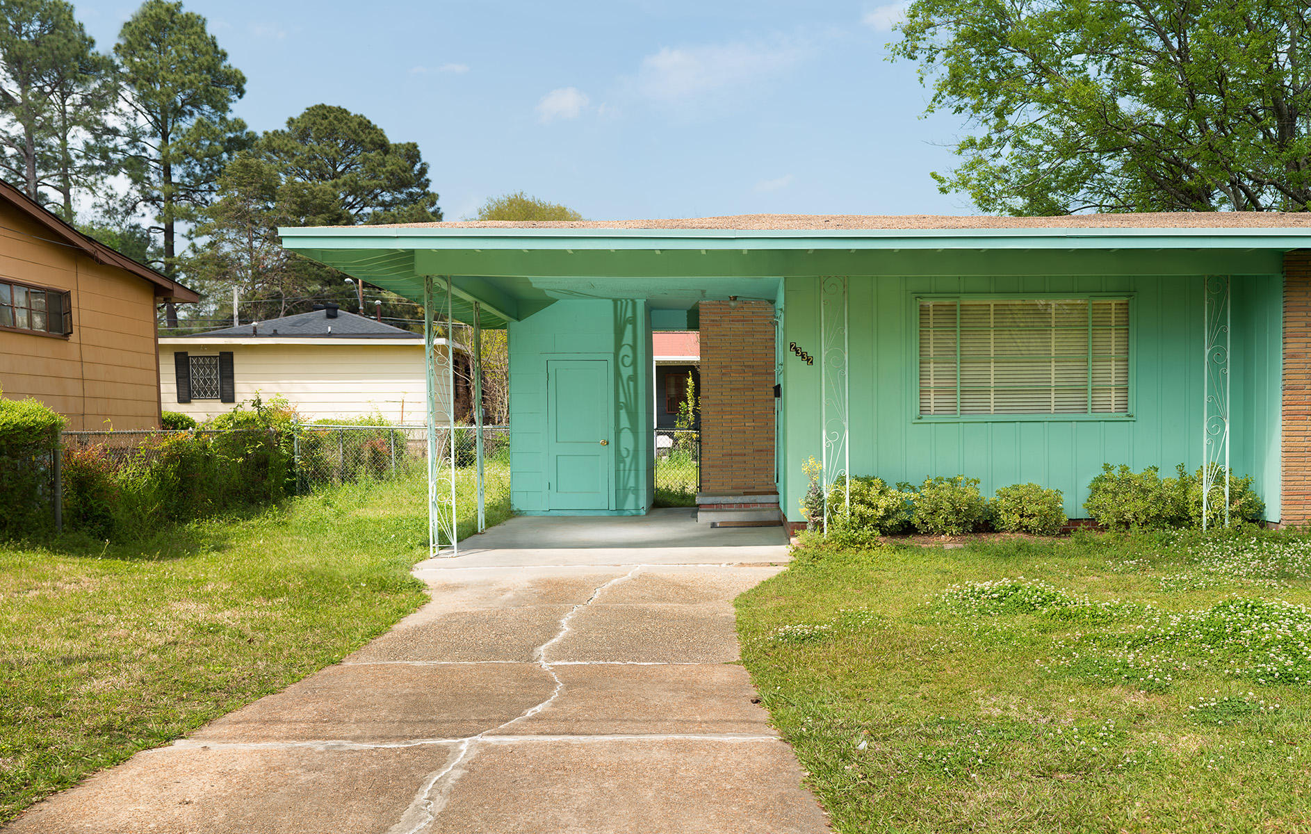 <div class="storycaption">
	<div class="galleryIntroTextArea holder">
		<div class="galleryIntroTextContent">
			<div class="galleryIntroTextContentInside">
				<div class="frishhead">
					MEDGAR EVERS' HOUSE 
				</div>
				<div class="frishsubhead">
					JACKSON, MISSISSIPPI 
				</div>
				<div class="frishtext">
					Shortly after midnight on June 12, 1963, Medgar Evers, the first Mississippi state field secretary for the National Association for the Advancement of Colored People pulled into the driveway of his humble home in Jackson. He had been at an integration meeting, watching President John F. Kennedy's speech on national television in support of civil rights. Emerging from his car carrying T-shirts that stated, "Jim Crow Must Go," Evers was struck in the back with a bullet that ricocheted into his home. He staggered 30 feet before collapsing, dying at the local hospital 50 minutes later. Less than 24 hours earlier George Wallace had dramatically stood in a doorway at the University of Alabama's Foster Auditorium, physically blocking the entrance of the first 2 African American students enrolled at the university. During World War II, Evers volunteered for the U.S. Army and participated in the Normandy invasion. In 1952, he joined the National Association for the Advancement of Colored People (NAACP). As a field worker for the NAACP, Evers traveled through his home state encouraging poor African Americans to register to vote and recruiting them into the civil rights movement. He was instrumental in getting witnesses and evidence for the Emmett Till murder case, which brought national attention to the plight of African Americans in the South. 
				</div>
				<div class="frishdate">
					PHOTOGRAPHED: 2018 
				</div>
			</div>
		</div>
	</div>
</div> : IMAGES : Ghosts of Segregation