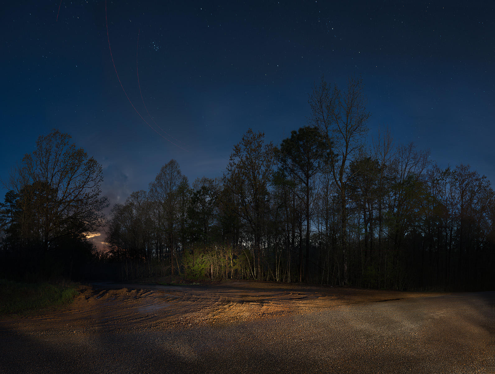 <div class="storycaption">
	<div class="galleryIntroTextArea holder">
		<div class="galleryIntroTextContent">
			<div class="galleryIntroTextContentInside">
				<div class="frishhead">
					MURDER SITE OF JAMES CHANEY, ANDREW GOODMAN AND MICKEY SCHWERNER 
				</div>
				<div class="frishsubhead">
					NESHOBA COUNTY, MISSISSIPPI 
				</div>
				<div class="frishtext">
					During the Freedom Summer of 1964 three civil rights activists were jailed briefly in the small Neshoba County jail on trumped up charges. When Mickey Schwerner, Andrew Goodman and James Chaney were released that night, they were followed by Ku Klux Klan members tipped off by the sheriff's office. They were forced off the road en route to their office in Meridian, taken to this remote backroads location and bludgeoned to death. Their bodies were later found in an earthen dam. 
				</div>
				<div class="frishdate">
					PHOTOGRAPHED: 2018 
				</div>
			</div>
		</div>
	</div>
</div> : IMAGES : Ghosts of Segregation